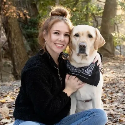 Madeline and her guide dog Mercury